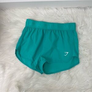 Gymshark Women's TRAINING LOOSE FIT SHORTS Size small Aqua Blue
